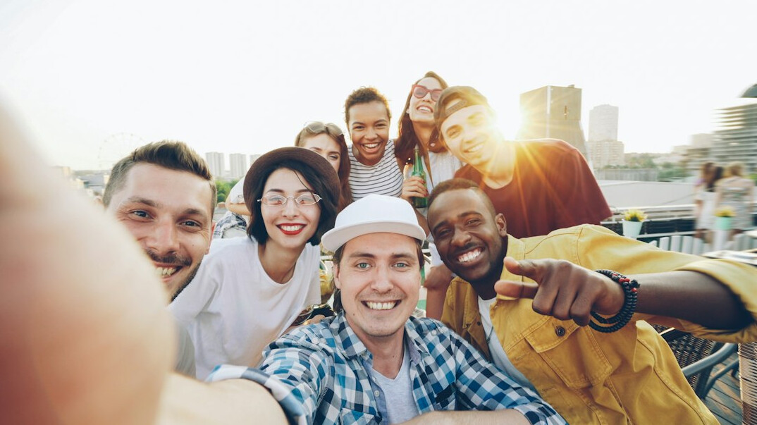 young people smiling in group