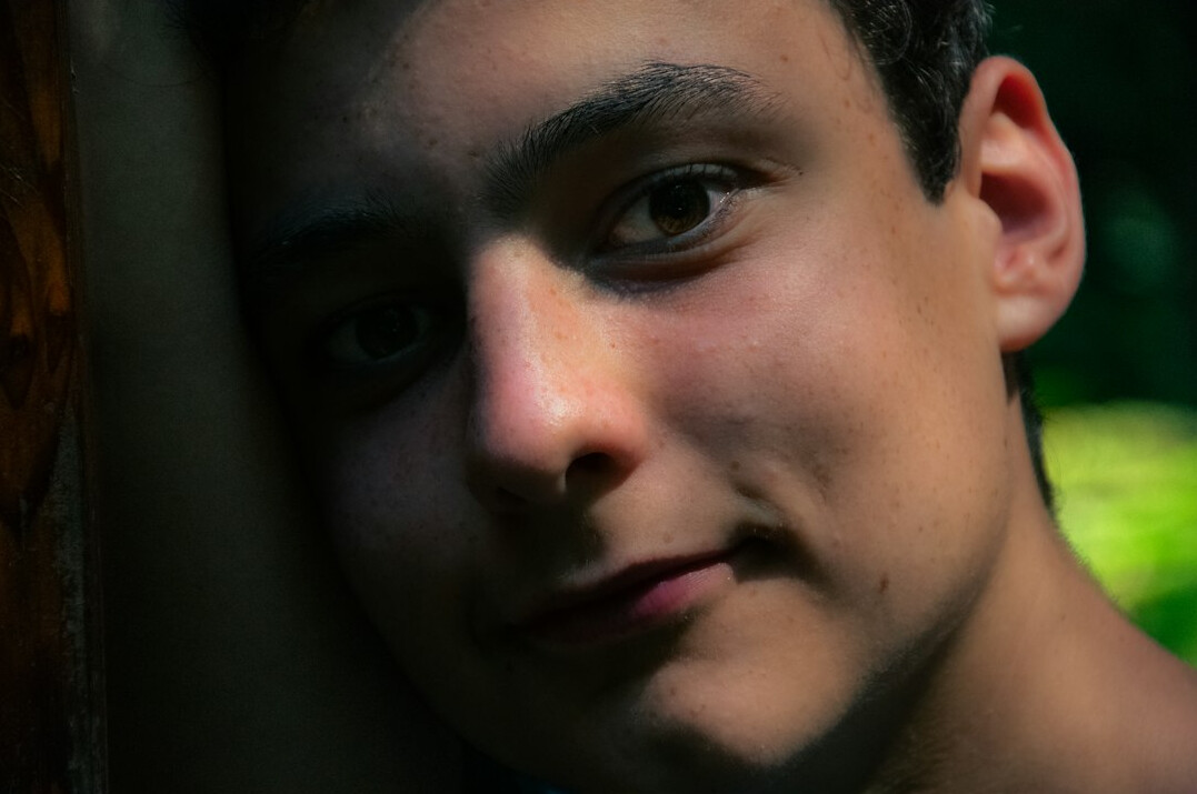 teen boy looking hopeful